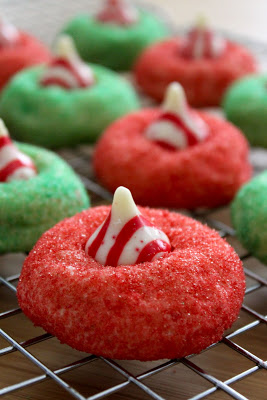 Candy Cane Blossoms | Baked Perfection. Click for more holiday cookie ideas! #christmascookie #cookieexchange