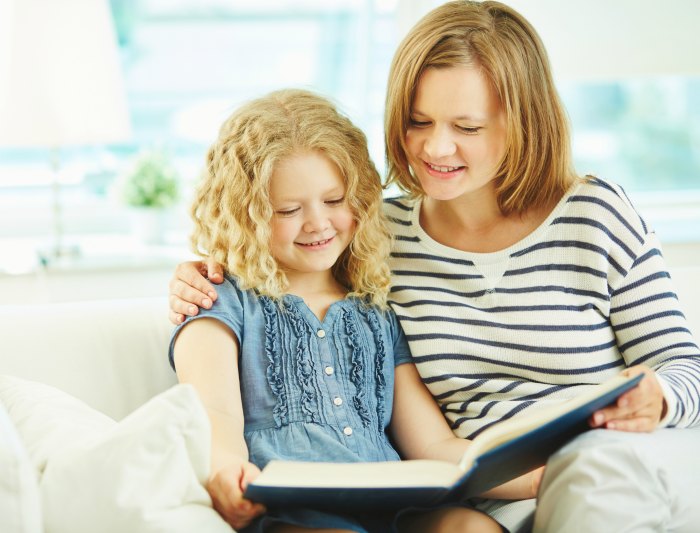 mom reading with girl