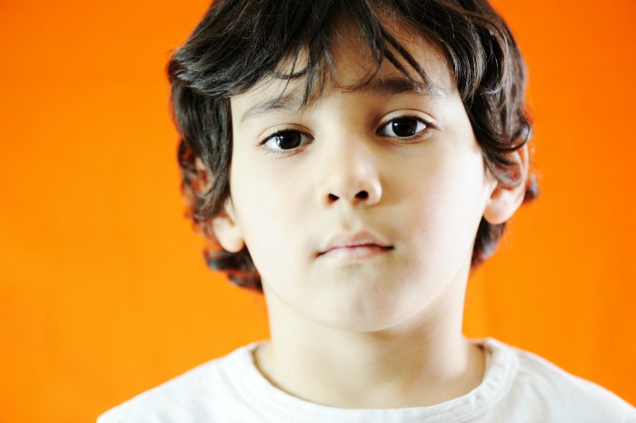 boy with orange background