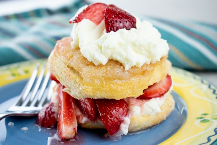 yum! strawberry shortcake with biscuits, whipped cream and strawberries