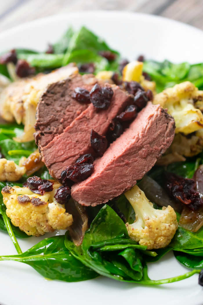 Salad with Beef Tenderloin, Roasted Cauliflower, Spinach and Dried Cranberries