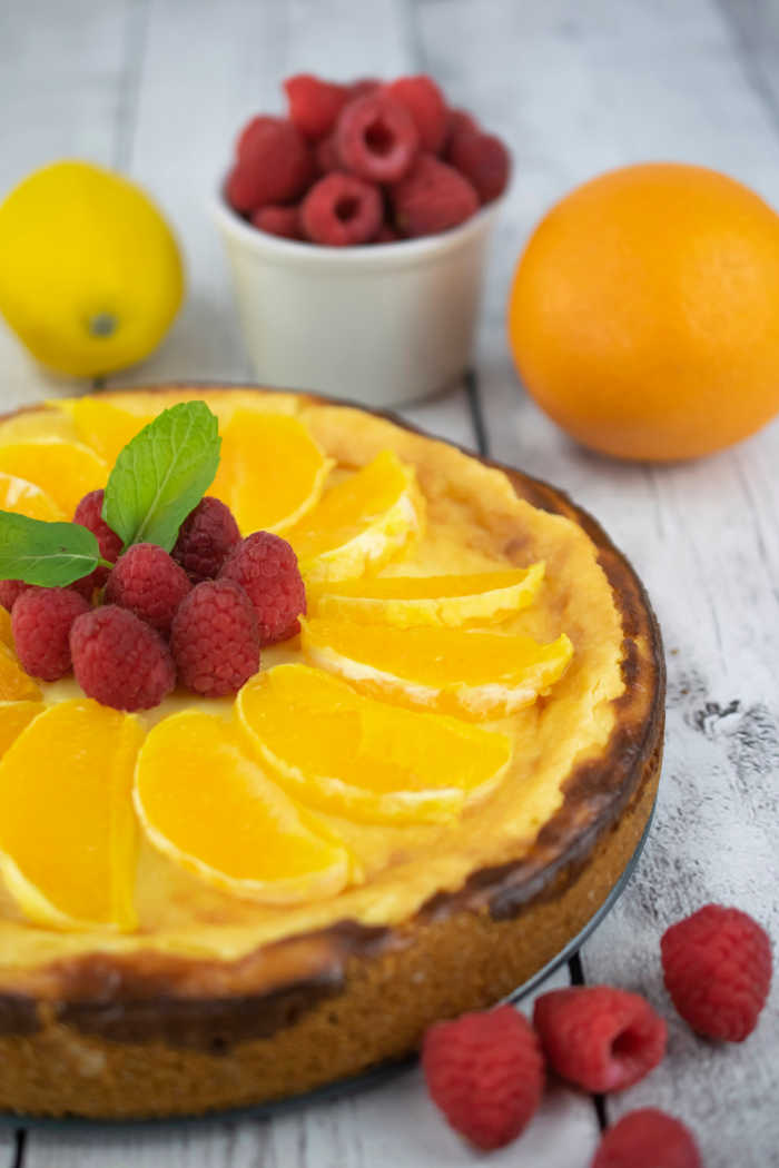 The Best Lemon Cheesecake EVER with fresh fruit