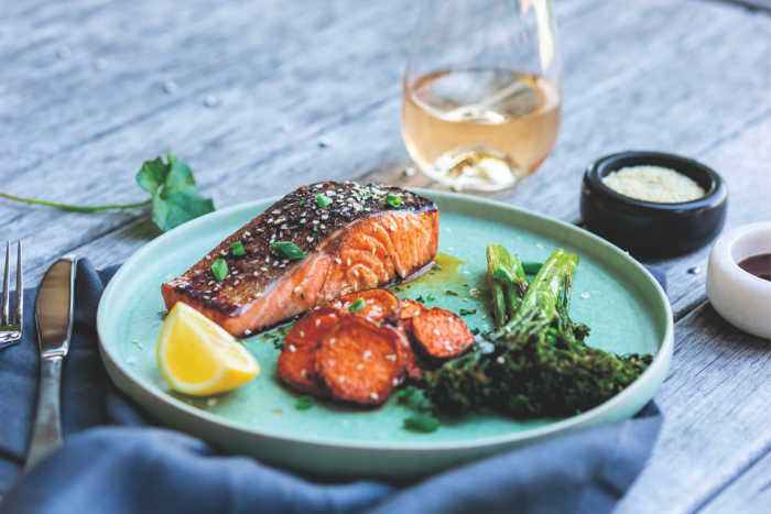 one dish japanese salmon recipe served with sweet potato and broccolini