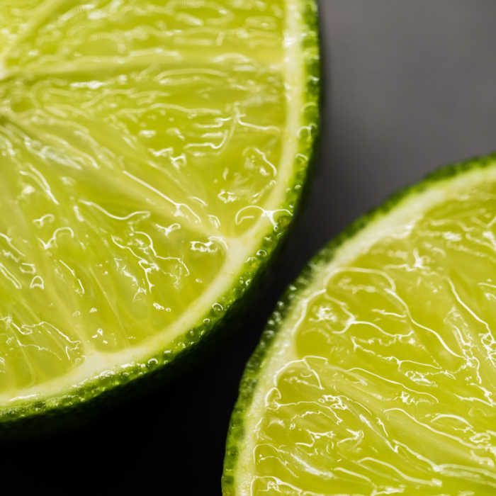 lime slices on black background