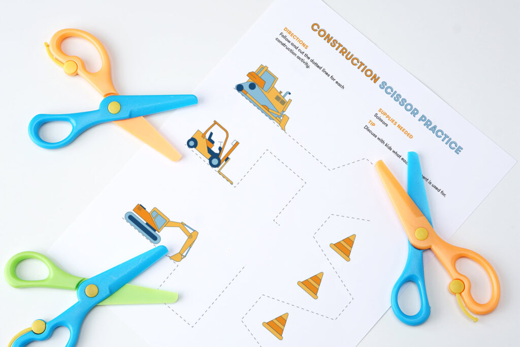 Scissor cutting activity featuring construction equipment lines - construction activities for kids