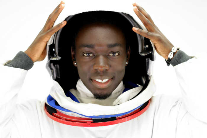 teenager in astronaut suit