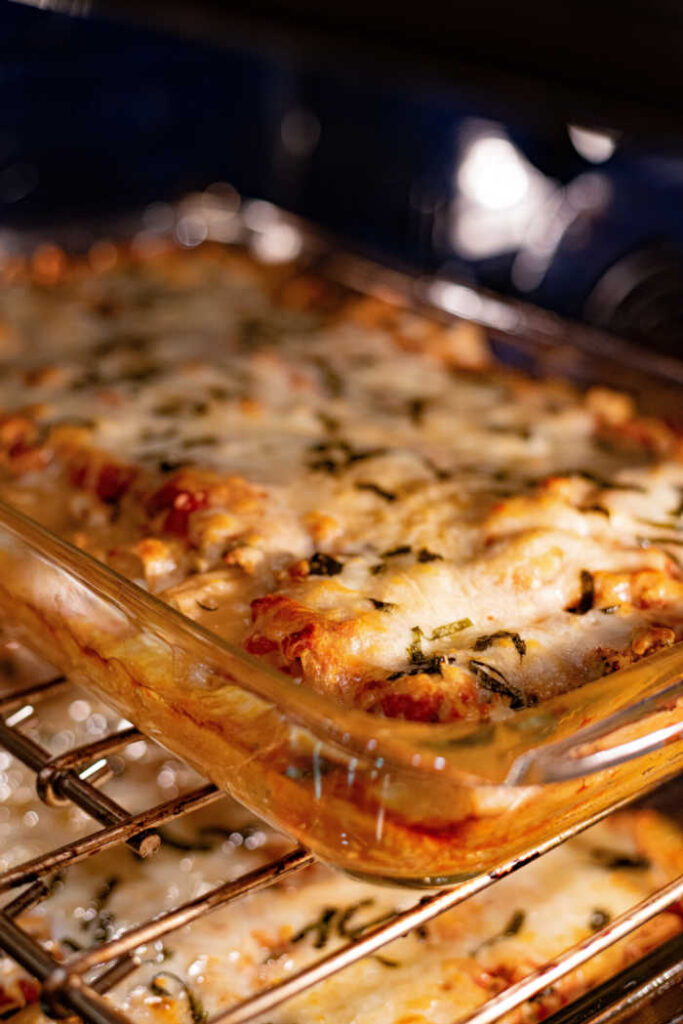 lasagna casserole baking in oven