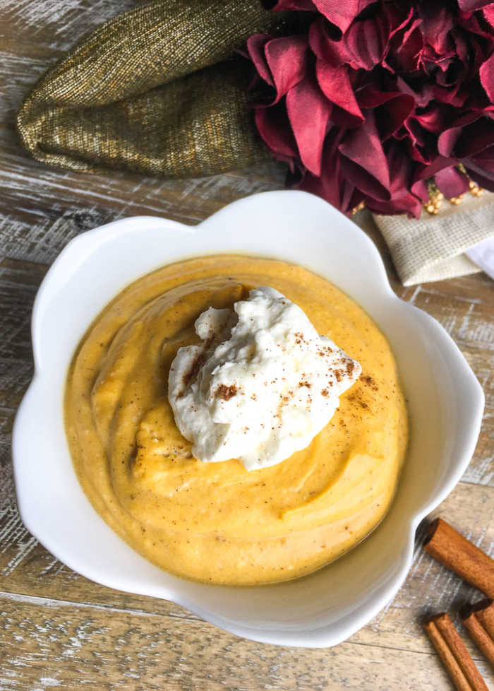 creamy pumpkin mousse in white bowl