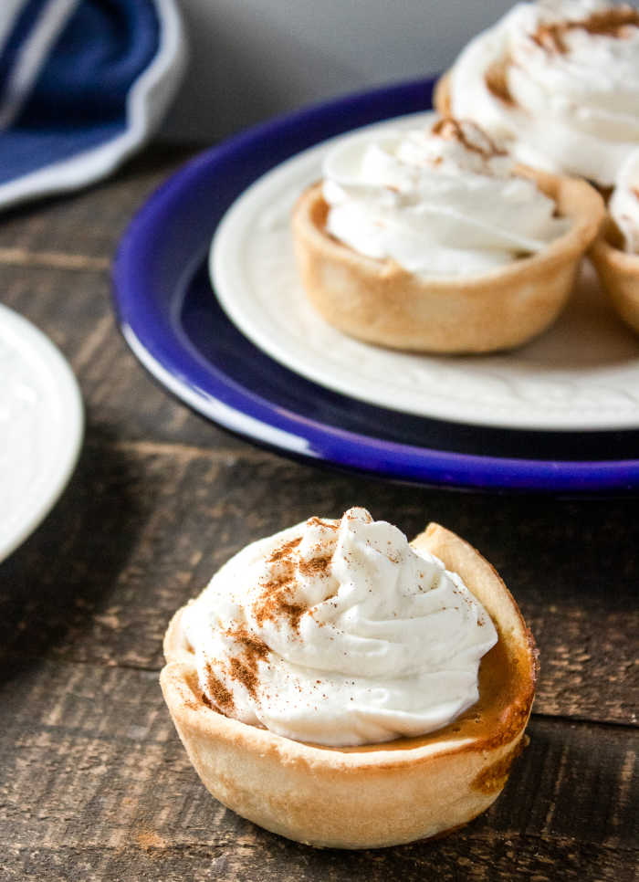Mini Pumpkin Pies put a fun twist on a Thanksgiving classic dessert that will leave an impression with your guests!