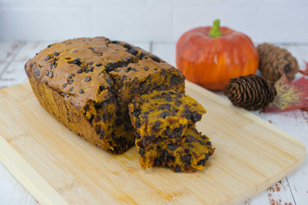 Light and moist with a crisp exterior, the signature pumpkin taste blends with the sweet chocolate to create a unique taste perfect for fall in this Pumpkin bread recipe.