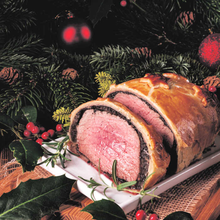 Classic beef Wellington slices and served with Christmas decor