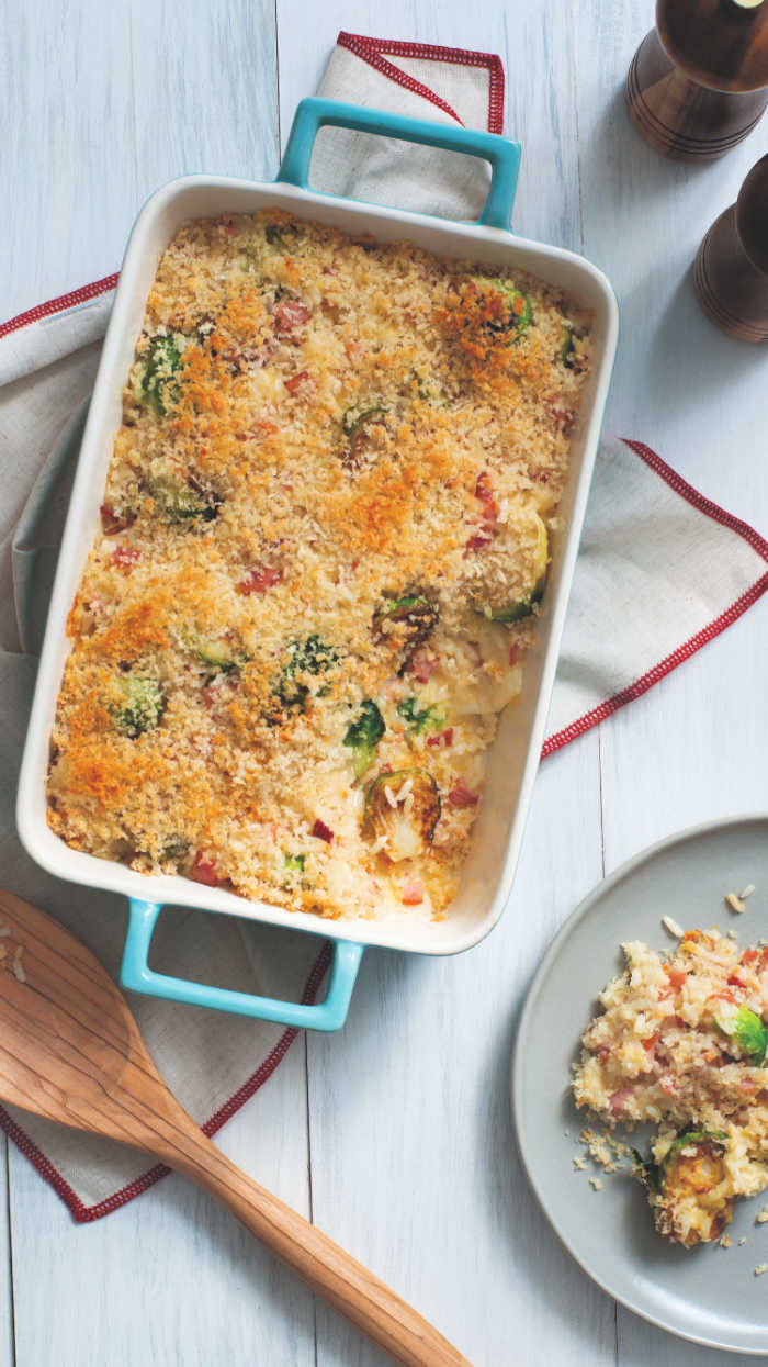 Au Gratin Ham Rice Casserole with Brussel sprouts are a tasty way to serve up a filling favorite with little effort using pantry staples. 