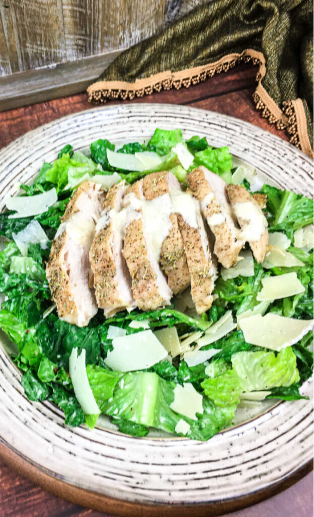 You can make the Best Chicken Caesar Salad Recipe at home with this amazing homemade dressing and seasoning your chicken just right.