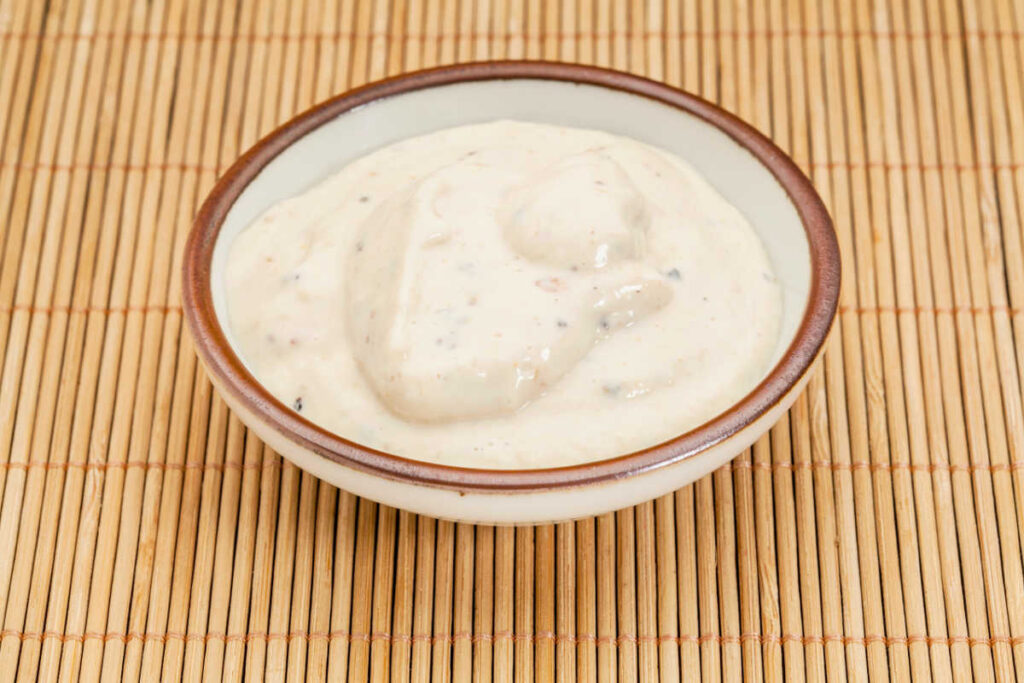 creamy horseradish sauce on bamboo placemat