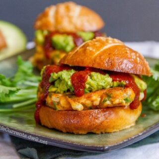 Image for Corn Fritter Sliders with Smashed Avocado and Enchilada Sauce on Pretzel Buns