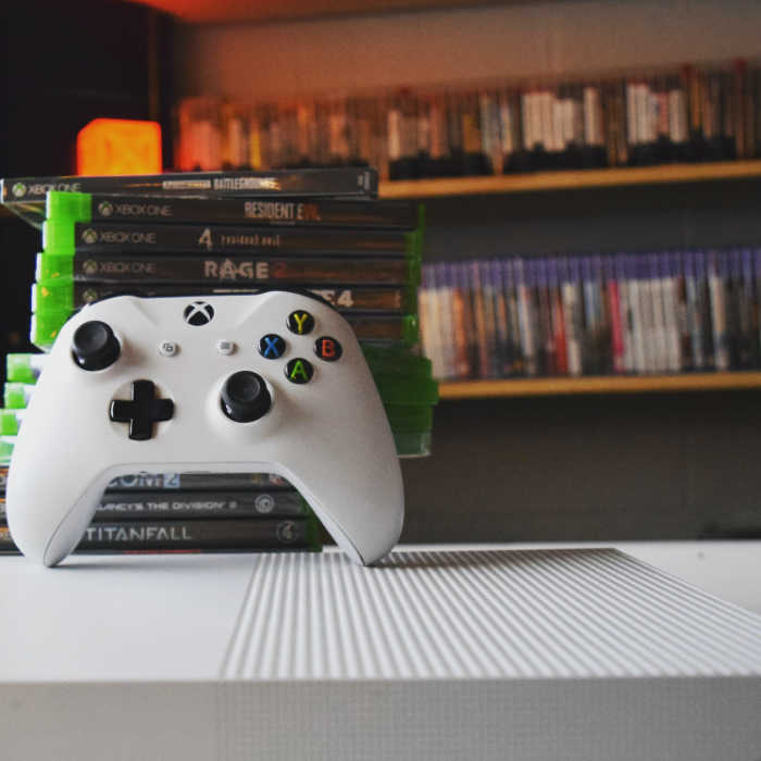 white xbox controller with games