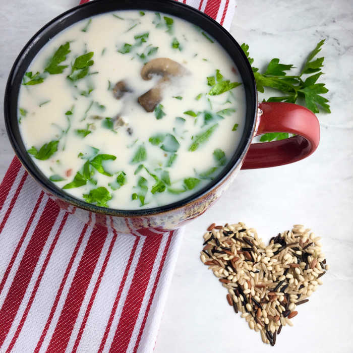Healthier Version of creamy wild rice and mushroom soup - in a red mug