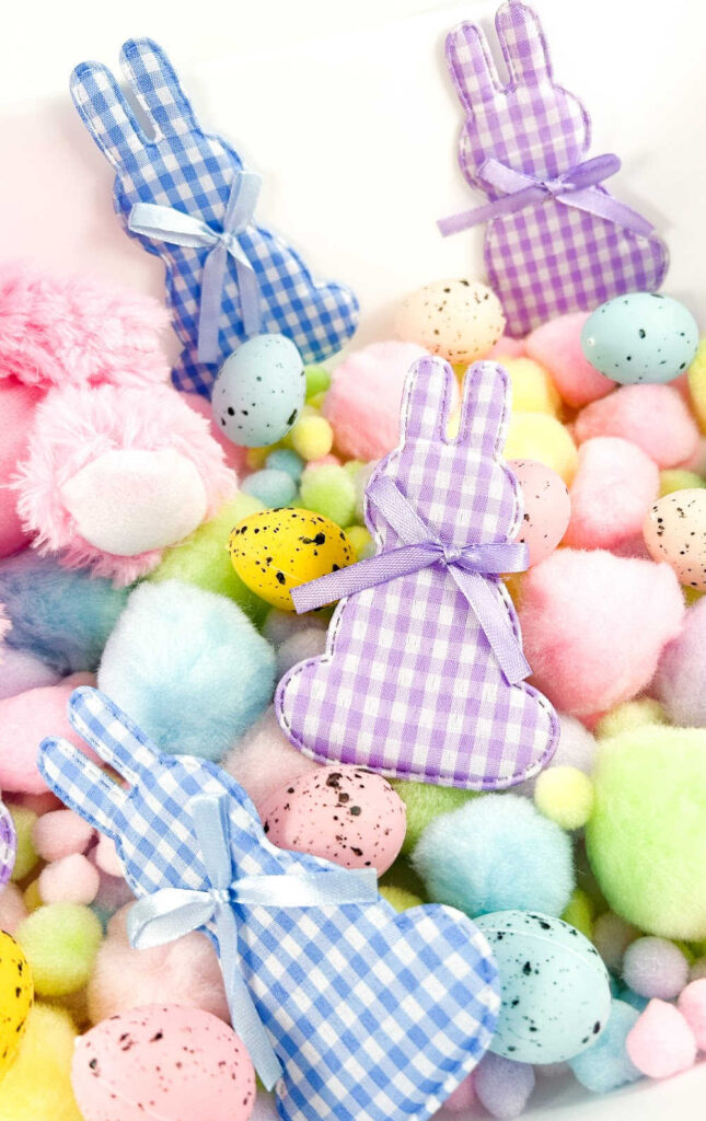 drop in these gingham cloth bunnies for additional visual stimulation during play with the easter bunny sensory bin
