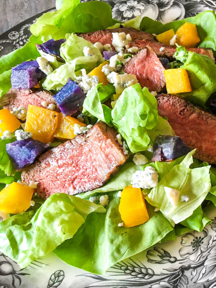 Marinated Strip Steak Salad with creamy blue cheese dressing is a mouthwatering dish that brings together the succulent flavors of marinated grilled steak and the creamy tanginess of blue cheese dressing. 