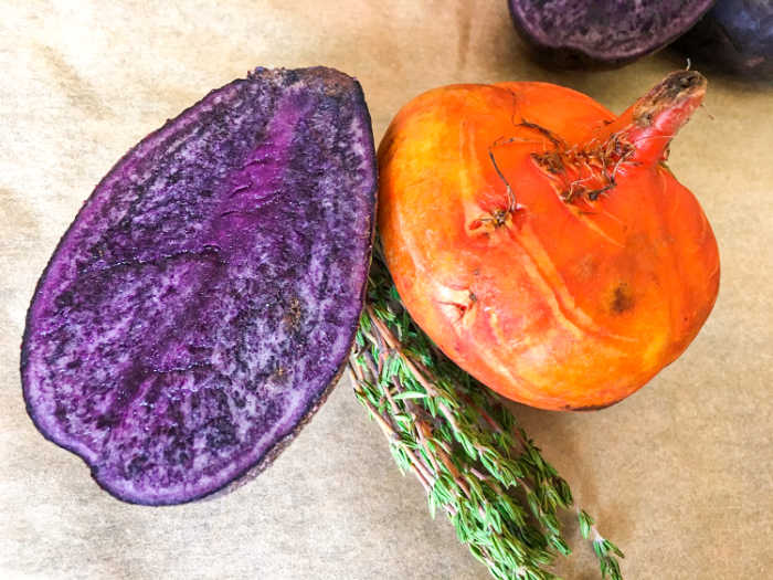 beet with a purple potato cut in half