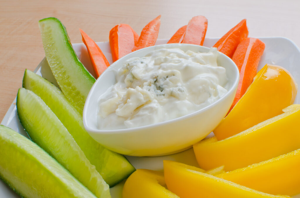 blue cheese dressing served with cucumbers, bell peppers and carrots
