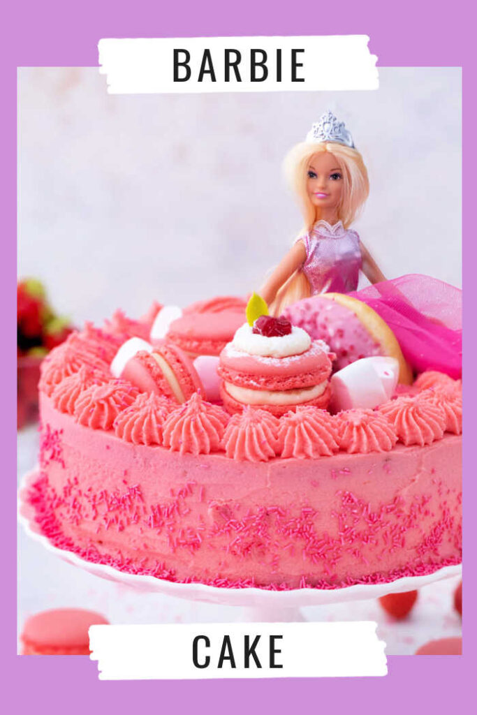 barbie doll on top of pink cake