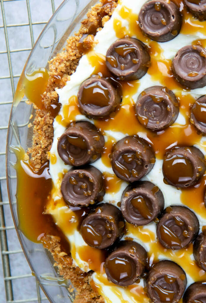 Easy No Bake Cheesecake Recipe is the perfect combination of simplicity and indulgence. With a buttery graham cracker crust, a lusciously creamy cheesecake filling and a drizzle of caramel sauce, each bite is a harmonious symphony of flavors and textures. 