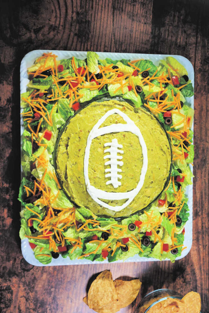 football game day appetizer layered taco dip recipe