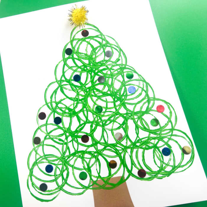 preschool christmas tree painting with a toilet paper roll