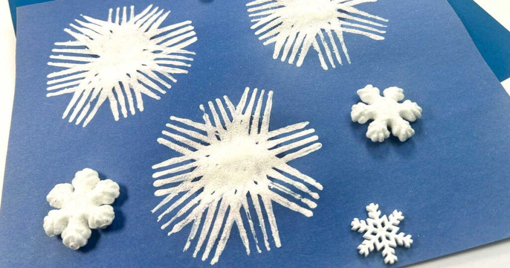 fork painted snowflakes for toddlers and preschools