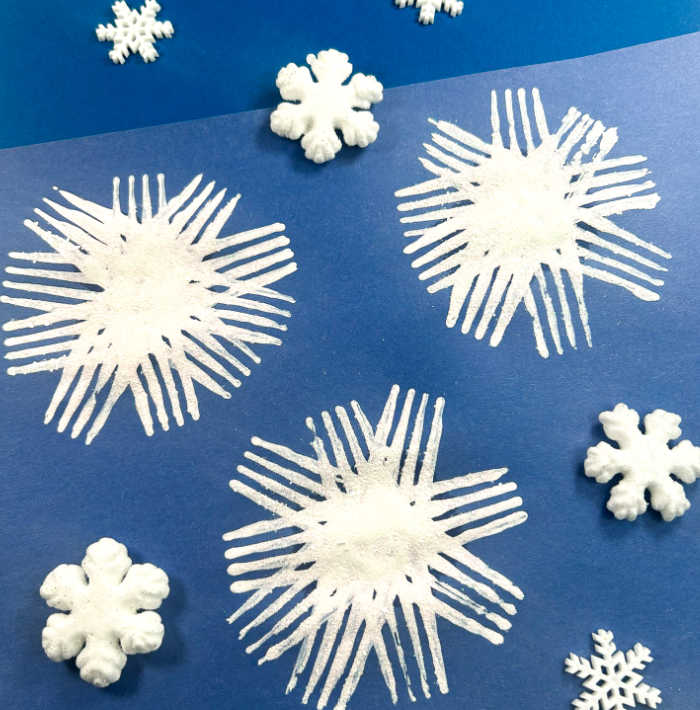 fork painted snowflakes craft for kids