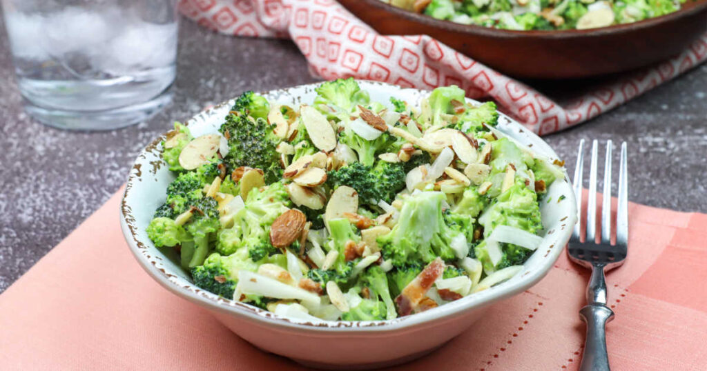 Best Broccoli Salad Recipe in bowl with fork