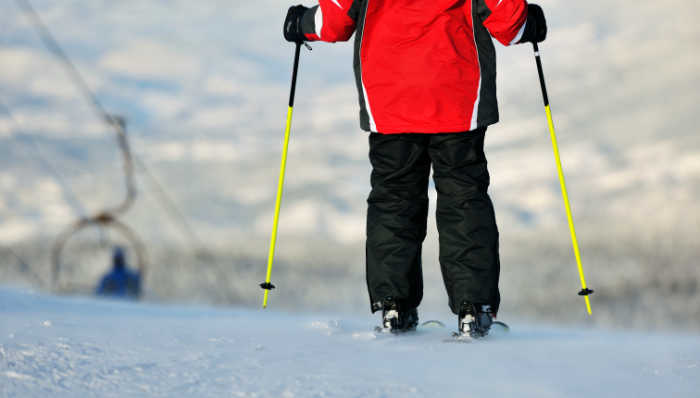 child skiing on mountain