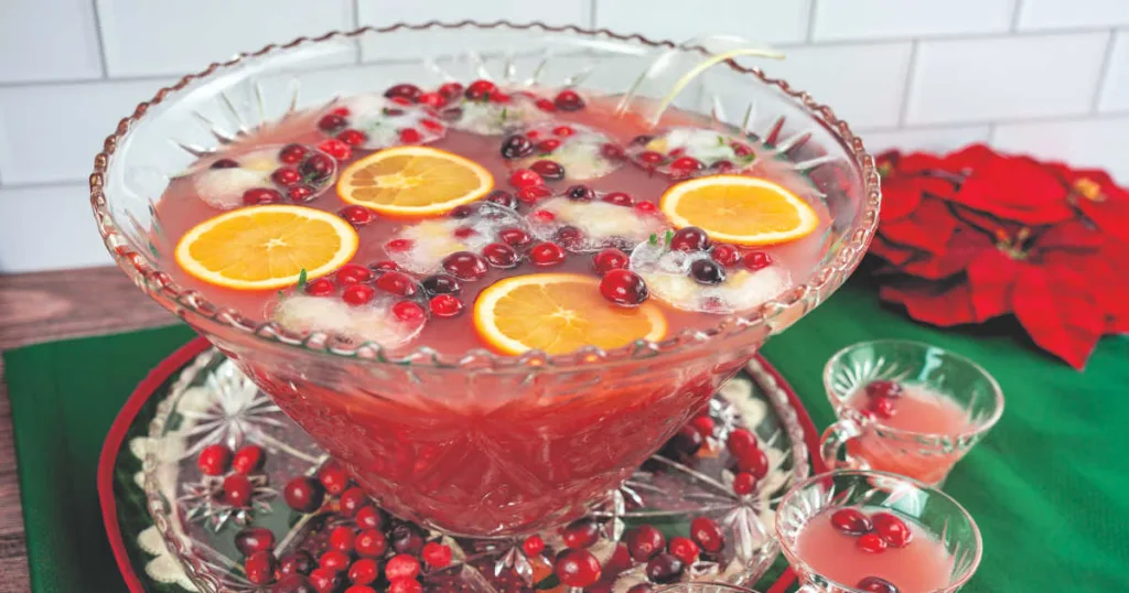 Christmas punch is a festive party drink traditionally served during the holidays, made by mixing fruit juices, soda or sparkling water and seasonal flavors like cranberry, citrus, pineapple, or spices. 