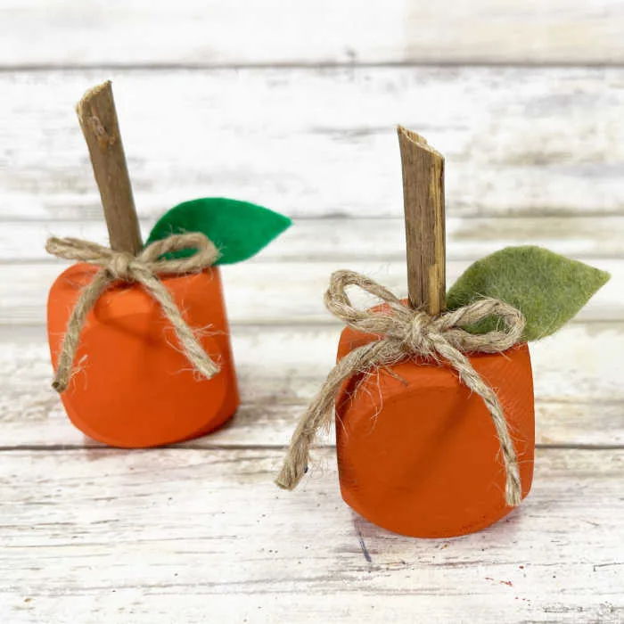 This wood dice pumpkin craft combines simplicity, creativity and fall charm into a project kids enjoy making and parents love decorating with.