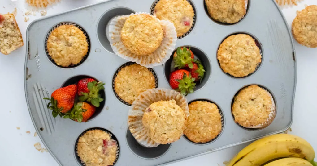 Strawberry Banana Muffins are comforting yet balanced for everyday enjoyment.