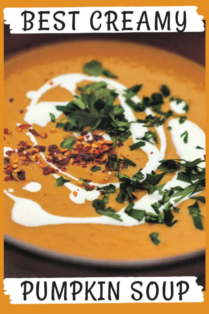 The BEST Creamy Pumpkin Soup blends sautéed vegetables, warm spices and rich pumpkin with cream and honey for a velvety texture and deeply comforting flavor that tastes slow-simmered and luxurious.