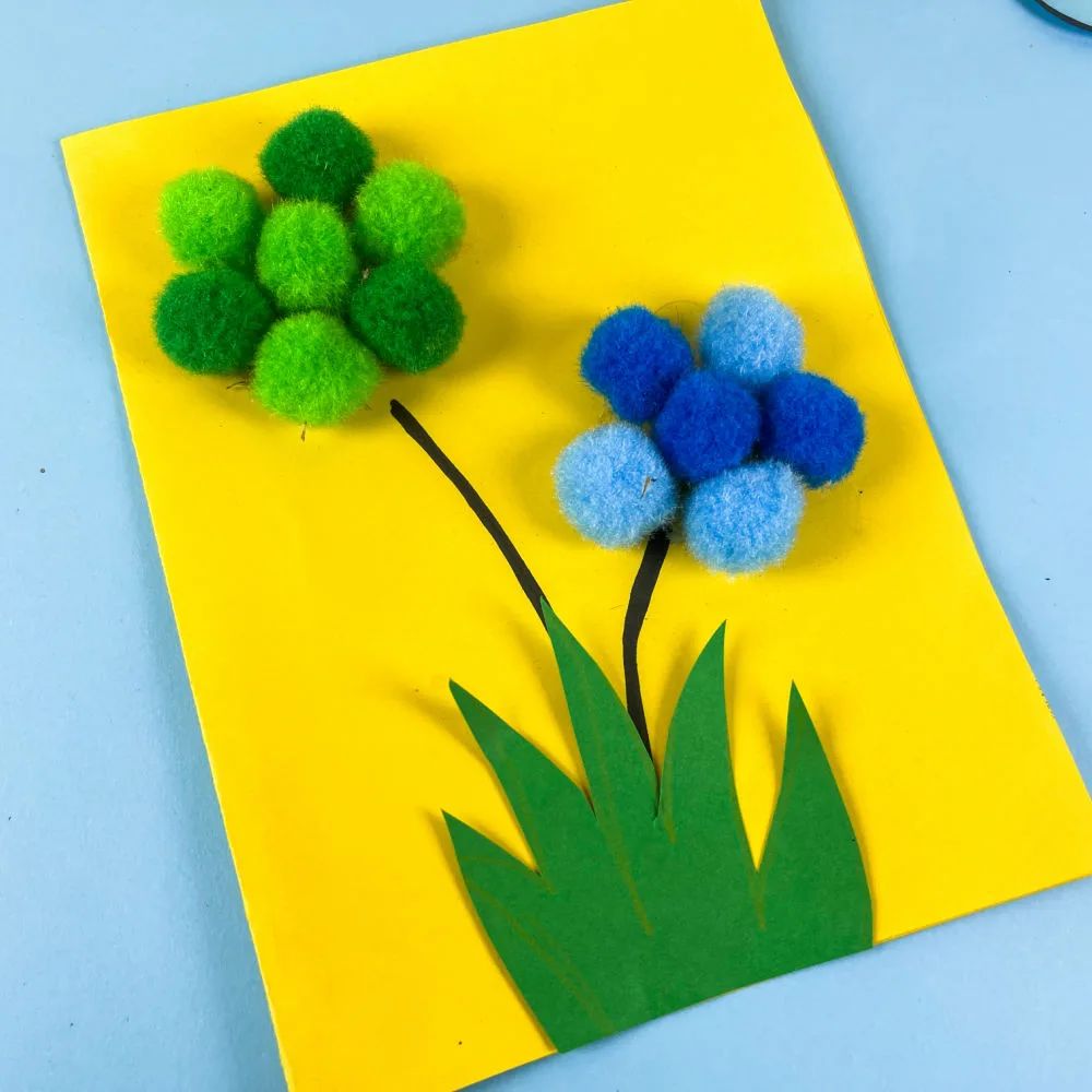 Pom Pom Flower Craft — a hands-on art project where kids build textured flowers while strengthening coordination and creative expression.
