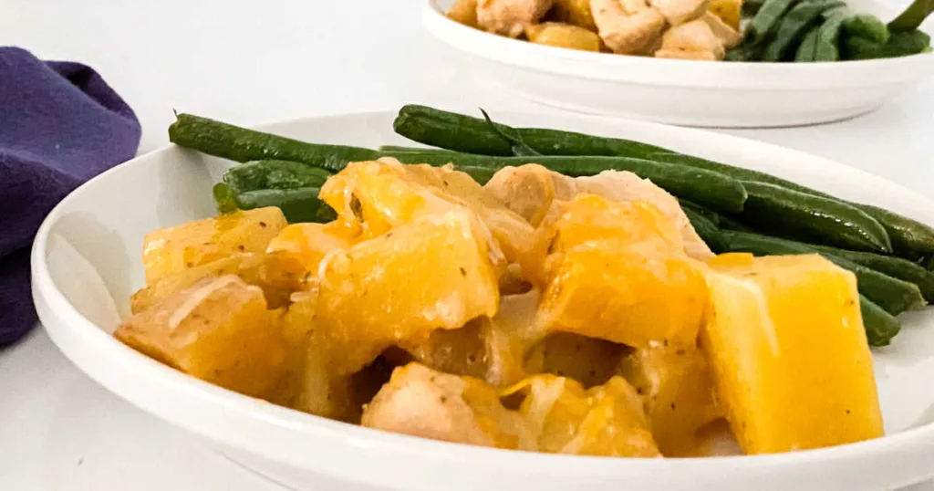 This slow cooker garlic chicken Parmesan combines juicy chicken, tender potatoes and creamy cheese in one simple, satisfying meal.