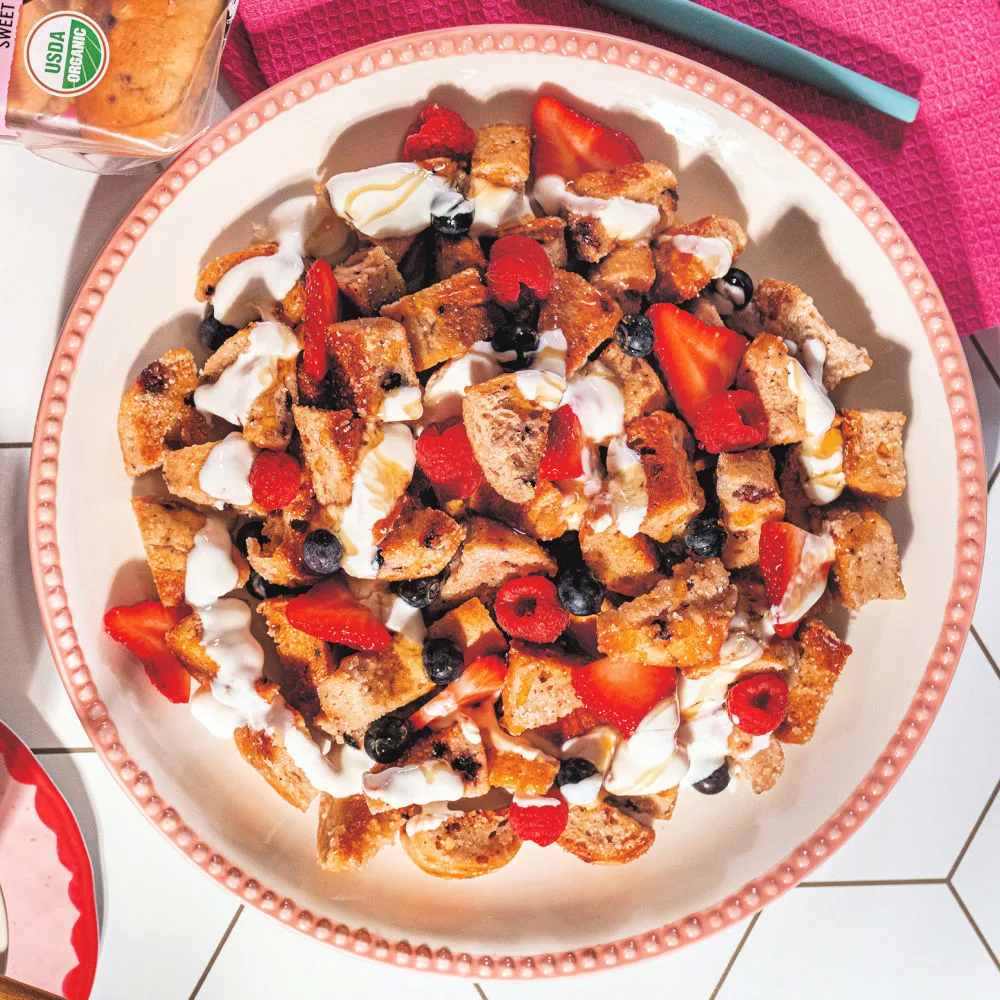 Panzanella is an Italian word that refers to a bread salad made with stale bread and fresh vegetables, especially tomatoes. My recipe, however, uses summer berries.