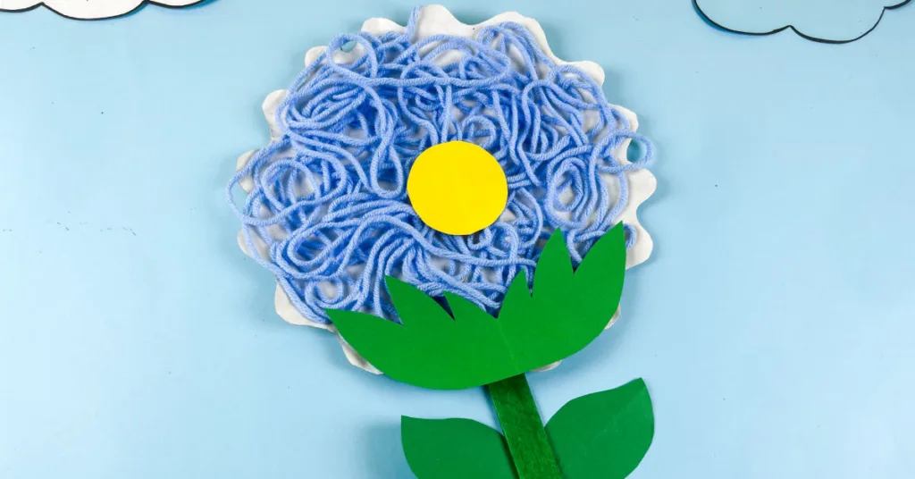 This yarn flower craft blends creativity, skill-building and seasonal fun into a project kids enjoy making.
