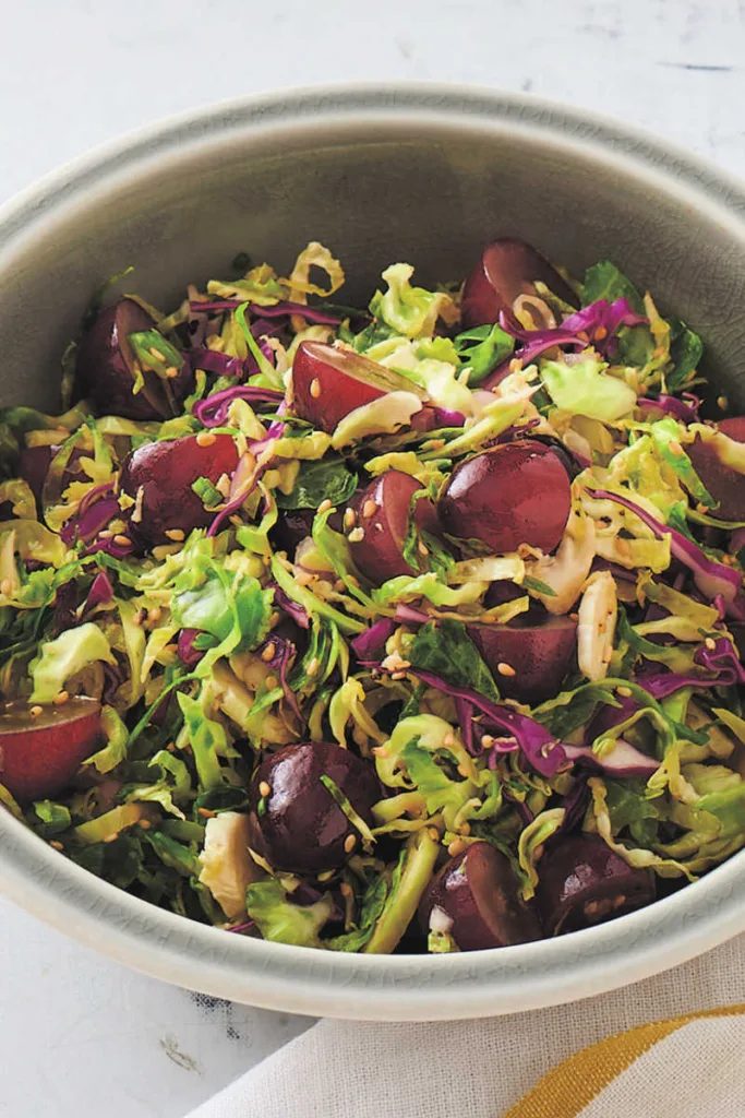 These ingredients come together to make a crisp and flavorful Brussels sprout slaw with a sweet-tangy dressing and a nutty sesame finish.