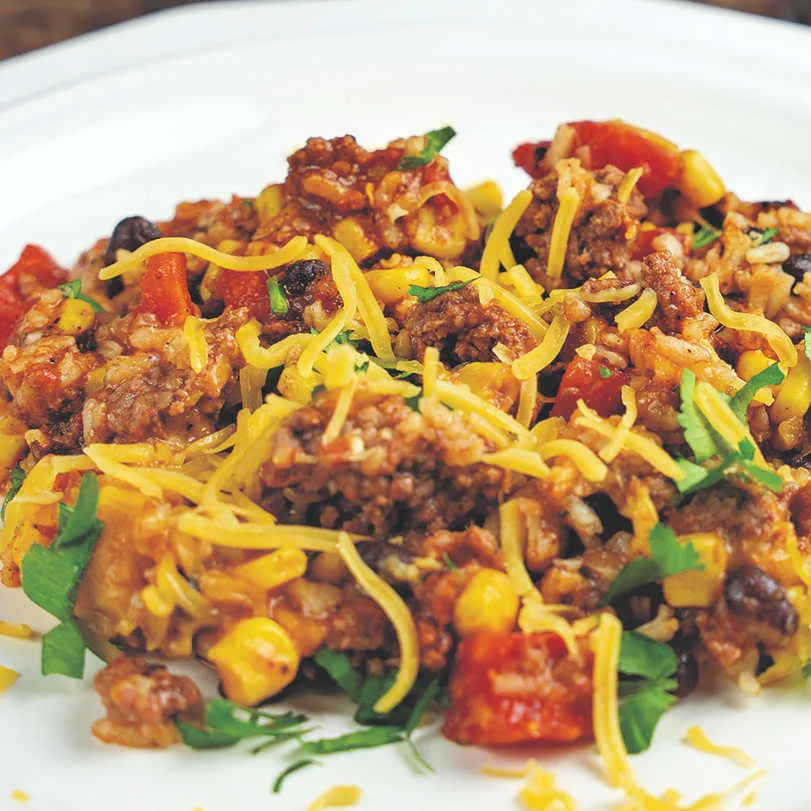 These ingredients come together to make a hearty beef enchilada casserole with bold flavor, tender rice and melty cheddar cheese.