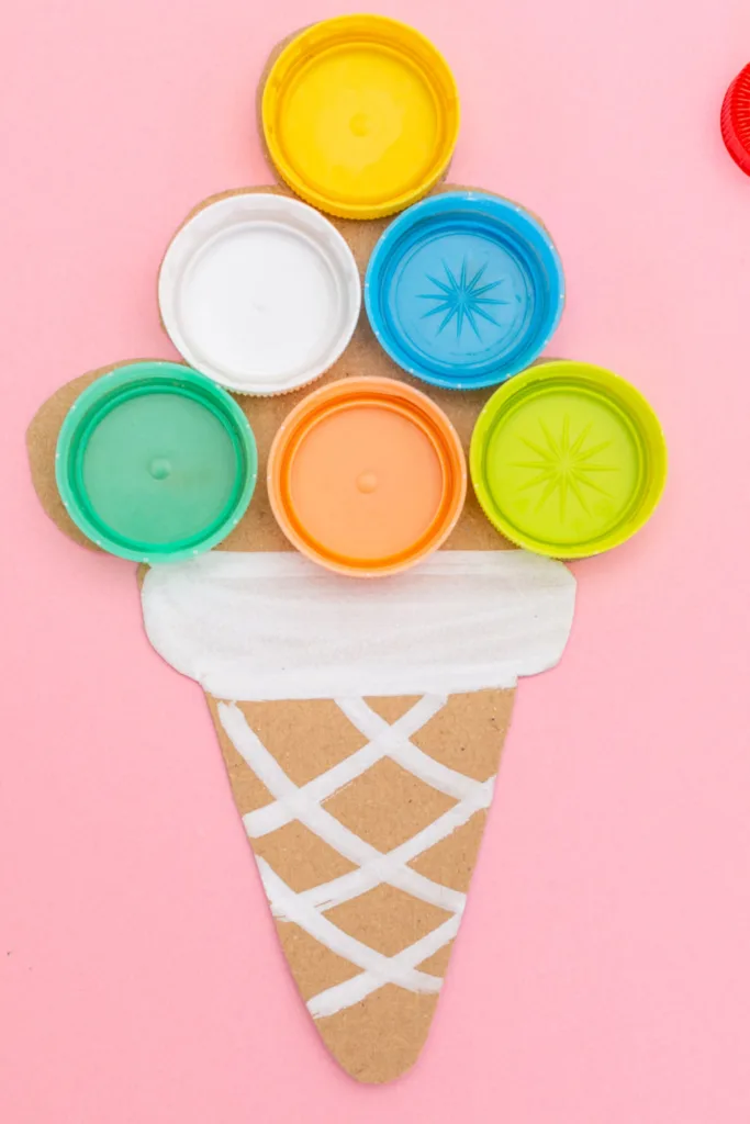 This bottle cap ice cream cone craft offers a fun and engaging way to explore creativity, fine motor skills and imaginative play using simple recycled materials.