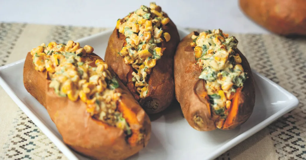 Corn stuffed sweet potatoes perfect for weeknight dinners, cookouts or casual entertaining.