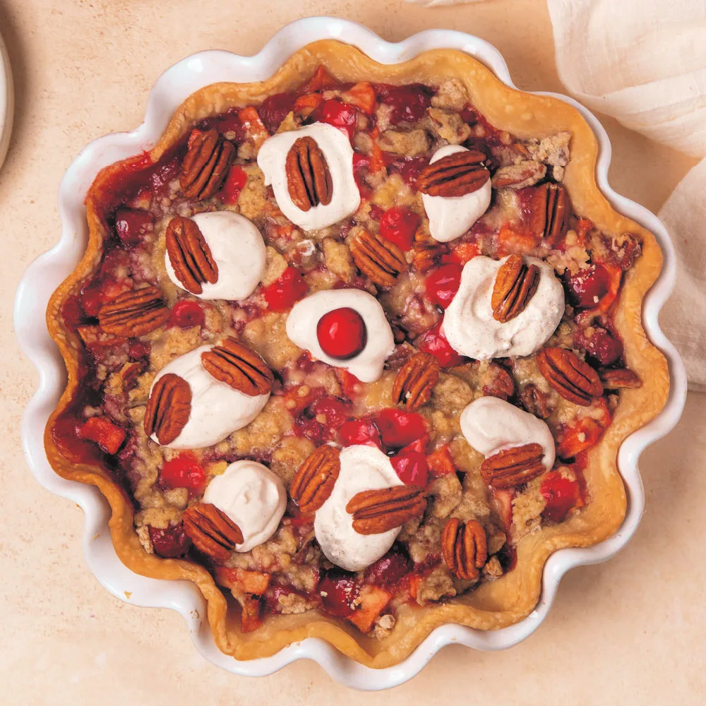 Cherry Apple Pie layers cherry and apple filling into a flaky crust, tops with streusel and bakes until golden and abubbling.