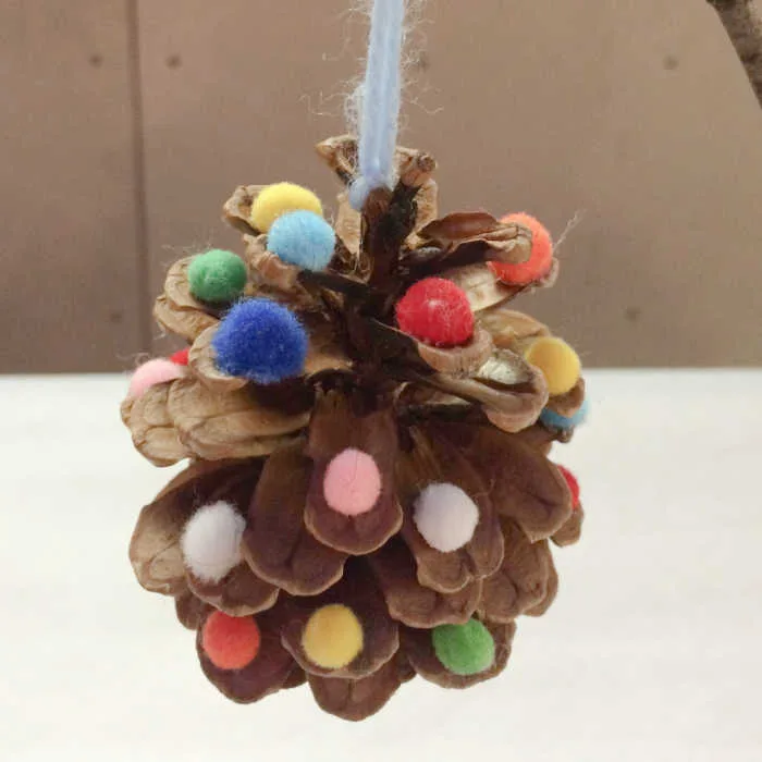 This pinecone ornament is a simple, meaningful way for kids to create handmade holiday decor that feels both festive and personal.